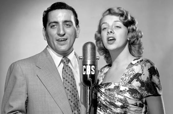 Tony Bennett: A Life in Music - The Timeless Journey of a Resounding Musical Icon 2 young Tony Bennett singing